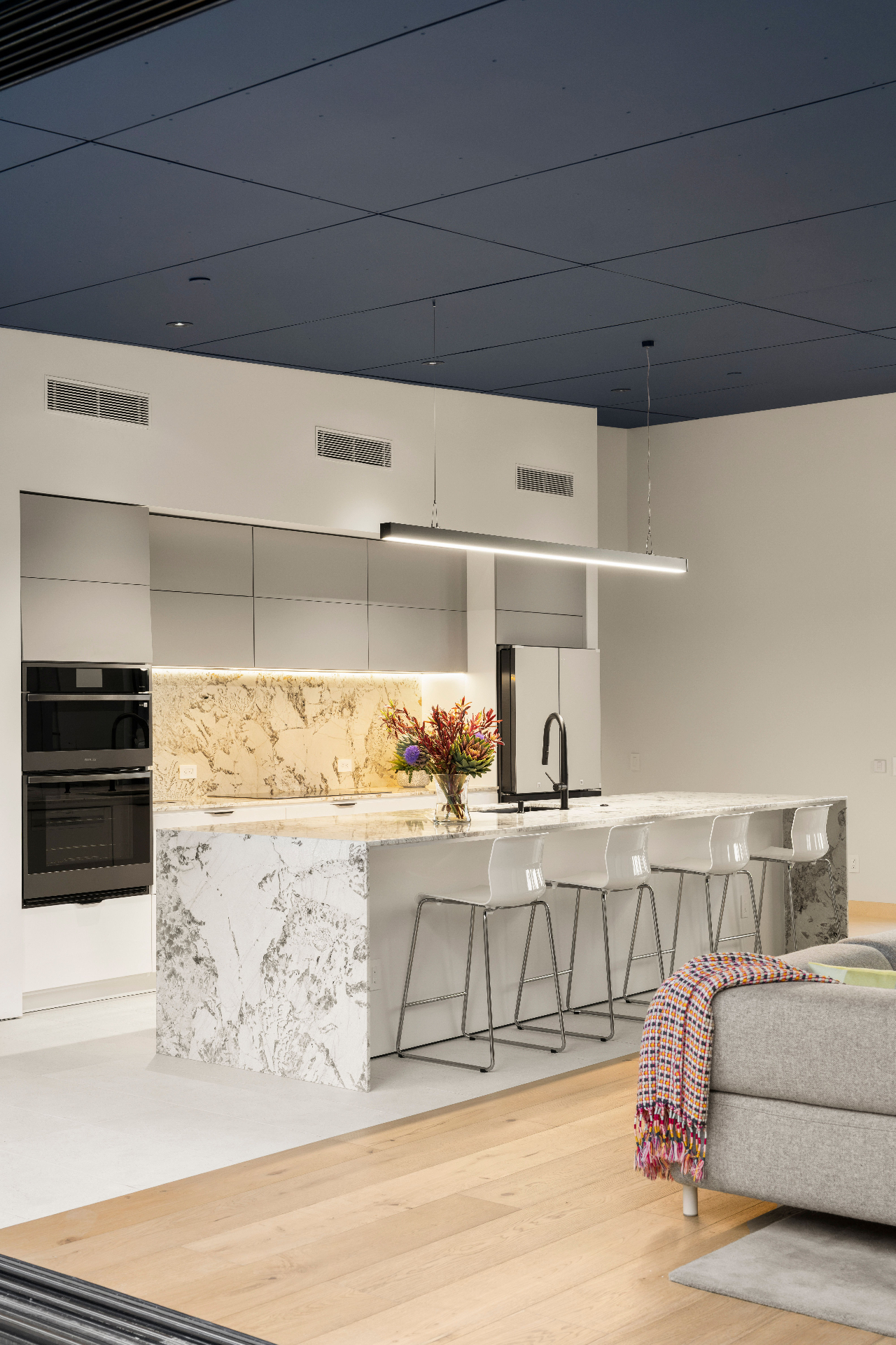 Kitchen island and linear pendant