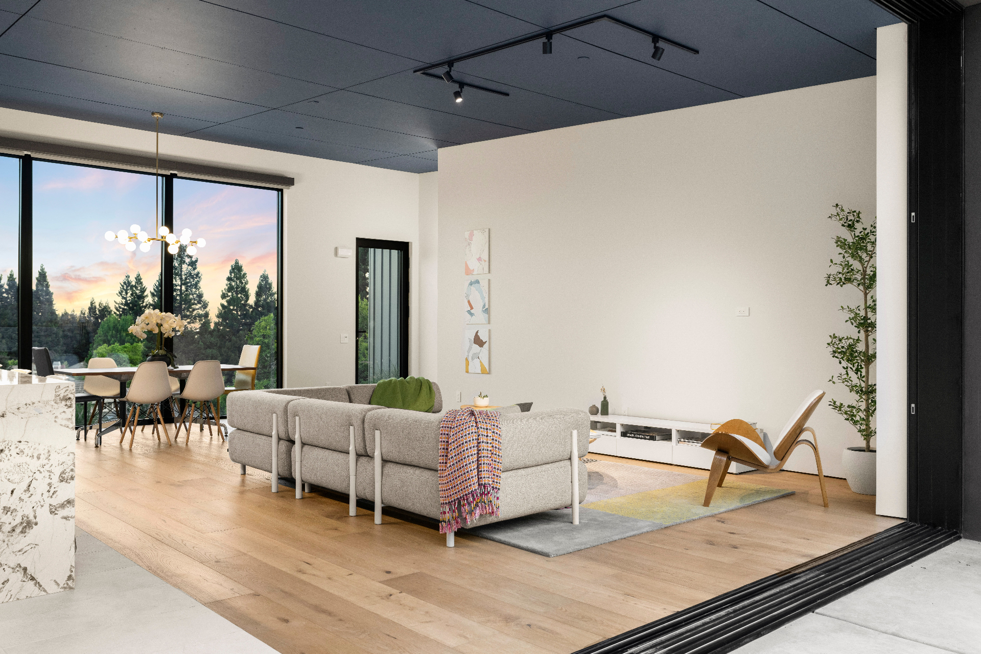 Living room opening to the patio at sunset